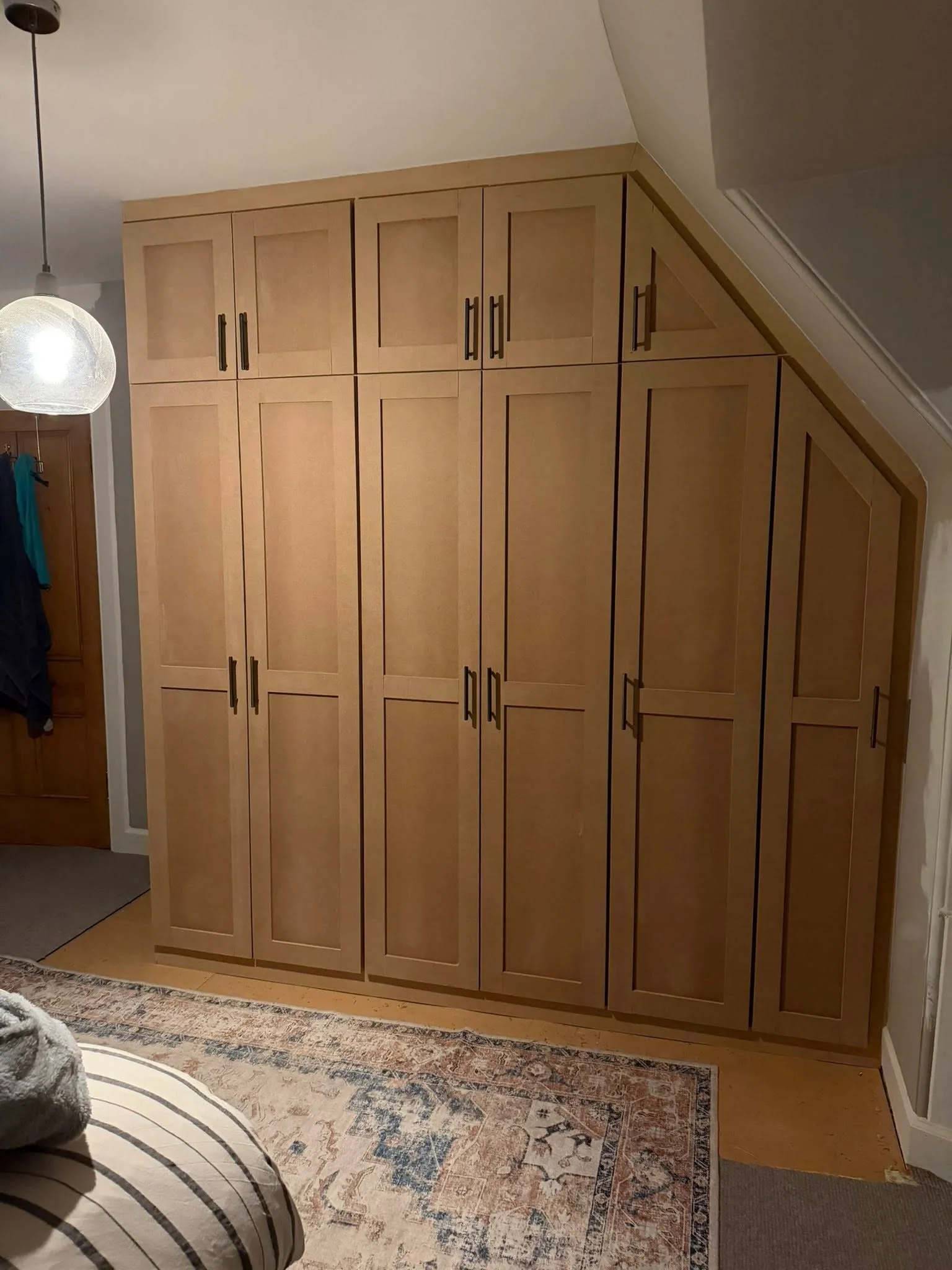 Bespoke wardrobe installation by T M Joinery